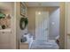 A hallway with a utility nook including a laundry area, a wreath, and bench at 263 Bennett Farms Trl, Acworth, GA 30102
