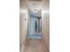 A carpeted hallway provides transition between rooms in this home at 263 Bennett Farms Trl, Acworth, GA 30102
