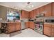 A well-equipped kitchen with stainless steel appliances, including a gas range and dishwasher at 263 Bennett Farms Trl, Acworth, GA 30102