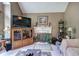 Comfortable living room featuring a fireplace and built-in shelving, perfect for relaxation and entertainment at 263 Bennett Farms Trl, Acworth, GA 30102