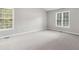 Bright bedroom with large windows, neutral tones, and plenty of space at 3902 Robin Court Ct, Acworth, GA 30101