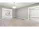 Spacious living room with neutral tones, and seamless flow to other rooms, perfect for entertaining at 3902 Robin Court Ct, Acworth, GA 30101