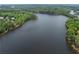 Expansive aerial view of the serene lake, highlighting the natural beauty of the surroundings at 504 Telfair Park, Peachtree City, GA 30269