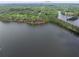 Stunning aerial view of the property on the lake showcasing its prime waterfront location at 504 Telfair Park, Peachtree City, GA 30269