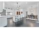 Gourmet kitchen with stainless steel appliances, ample cabinet space, and an open layout to dining area at 504 Telfair Park, Peachtree City, GA 30269