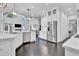 Bright kitchen featuring white cabinets, stainless steel appliances, and a large island at 504 Telfair Park, Peachtree City, GA 30269