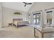 Spacious main bedroom with high ceilings, deck access, and natural light at 504 Telfair Park, Peachtree City, GA 30269