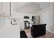 Bright kitchen with white cabinets, stainless steel appliances, and kitchen island at 5870 Shadewater Dr. Dr, Cumming, GA 30041