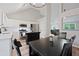Well-appointed kitchen with stainless steel appliances, central island, and a view of the living area at 5870 Shadewater Dr. Dr, Cumming, GA 30041