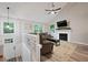 Inviting living room with fireplace, vaulted ceilings, and lots of natural light at 5870 Shadewater Dr. Dr, Cumming, GA 30041