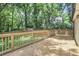 Large wooden deck surrounded by lush trees at 911 Oakland Sw Dr, Atlanta, GA 30310