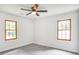 Well-lit bedroom with hardwood windows and ample natural light at 911 Oakland Sw Dr, Atlanta, GA 30310