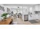Bright, open-concept living space with new appliances, countertops and hardwood flooring at 911 Oakland Sw Dr, Atlanta, GA 30310