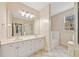 Bathroom features double sinks, a large mirror, and ample counter space, plus a separate shower at 2303 Stratford Commons Commons, Decatur, GA 30033