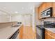 Well-equipped kitchen with stainless-steel appliances and a stylish countertop at 2303 Stratford Commons Commons, Decatur, GA 30033