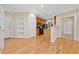 Open floor plan featuring hardwood floors, built-in shelves, and stainless-steel appliances at 2303 Stratford Commons Commons, Decatur, GA 30033
