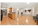 Spacious living area with hardwood floors, kitchen counter, and bright windows at 2303 Stratford Commons Commons, Decatur, GA 30033