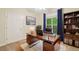 Home office featuring a desk, bookshelf, and large window with natural light at 2303 Stratford Commons Commons, Decatur, GA 30033