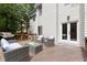 Charming back deck area with outdoor seating and stylish furniture at 4392 Windsor Oaks Cir, Marietta, GA 30066