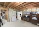 Unfinished basement offers potential for customization, featuring exposed beams and ample space for storage at 4392 Windsor Oaks Cir, Marietta, GA 30066