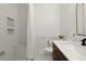 Renovated bathroom showcases a tiled shower with built-in bench, modern fixtures, and marble floors at 4392 Windsor Oaks Cir, Marietta, GA 30066