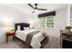 Cozy bedroom with natural light, modern ceiling fan and neutral decor at 4392 Windsor Oaks Cir, Marietta, GA 30066