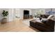 A comfy living room features hardwood floors, modern decor, and plenty of space for entertaining and relaxing at 4392 Windsor Oaks Cir, Marietta, GA 30066