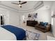 Large primary bedroom with tray ceilings, fireplace and hardwood floors at 4392 Windsor Oaks Cir, Marietta, GA 30066
