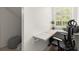 Bright office nook with built-in desk, natural light, and modern chair, perfect for a home workspace at 4392 Windsor Oaks Cir, Marietta, GA 30066