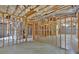 Unfinished basement with exposed ductwork, insulation, and framing, offering ample space for future customization and expansion at 511 Millwood Ct, Canton, GA 30114
