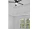 Tray ceiling with a ceiling fan and a window at 511 Millwood Ct, Canton, GA 30114