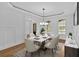 Dining room with table setting, a modern light fixture and natural light at 511 Millwood Ct, Canton, GA 30114