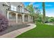 Landscaped front yard with a walkway leading to the front porch of a two-story home at 511 Millwood Ct, Canton, GA 30114