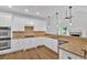Gourmet kitchen with stainless steel appliances and granite countertops at 511 Millwood Ct, Canton, GA 30114