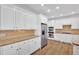 Gourmet kitchen with stainless steel appliances and granite countertops at 511 Millwood Ct, Canton, GA 30114