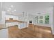 Open concept kitchen with island and eat-in breakfast nook at 511 Millwood Ct, Canton, GA 30114