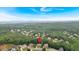 A beautiful home nestled in a lush, green neighborhood with mature trees and manicured lawns at 511 Millwood Ct, Canton, GA 30114