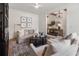 Bright sitting room featuring neutral decor and elegant lighting at 5305 Memento Trace, Cumming, GA 30040