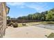 The home includes a large backyard, partially finished in concrete and partially in grass at 2700 Norwich Trce, Snellville, GA 30078