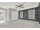 Spacious bedroom features a ceiling fan, large window and geometric accent wall at 4955 Day Lily Nw Way, Acworth, GA 30102