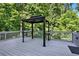 Gazebo on deck surrounded by lush greenery at 4955 Day Lily Nw Way, Acworth, GA 30102