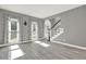 Living room featuring hardwood floors and natural light at 4955 Day Lily Nw Way, Acworth, GA 30102