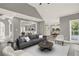 Spacious living room featuring modern decor, open layout, and seamless transition to other living spaces at 4955 Day Lily Nw Way, Acworth, GA 30102