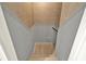 Stairway with light gray walls, white trim, and hardwood flooring at 4955 Day Lily Nw Way, Acworth, GA 30102