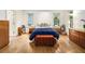 Bedroom with hardwood floors, lots of natural light, and stylish furnishings at 80 Stratford Ne Pl, Atlanta, GA 30342
