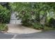 Beautiful home exterior with a two-car garage and lush landscaping at 80 Stratford Ne Pl, Atlanta, GA 30342
