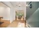 Inviting foyer with hardwood floors and views into the living spaces at 80 Stratford Ne Pl, Atlanta, GA 30342