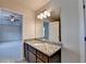 Stylish bathroom vanity with granite countertop and ample storage, conveniently located near the bedroom at 829 Still Hill Ln, Lawrenceville, GA 30045