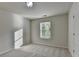 Bedroom with carpet flooring and natural light at 829 Still Hill Ln, Lawrenceville, GA 30045