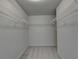Walk-in closet with wire shelving at 829 Still Hill Ln, Lawrenceville, GA 30045